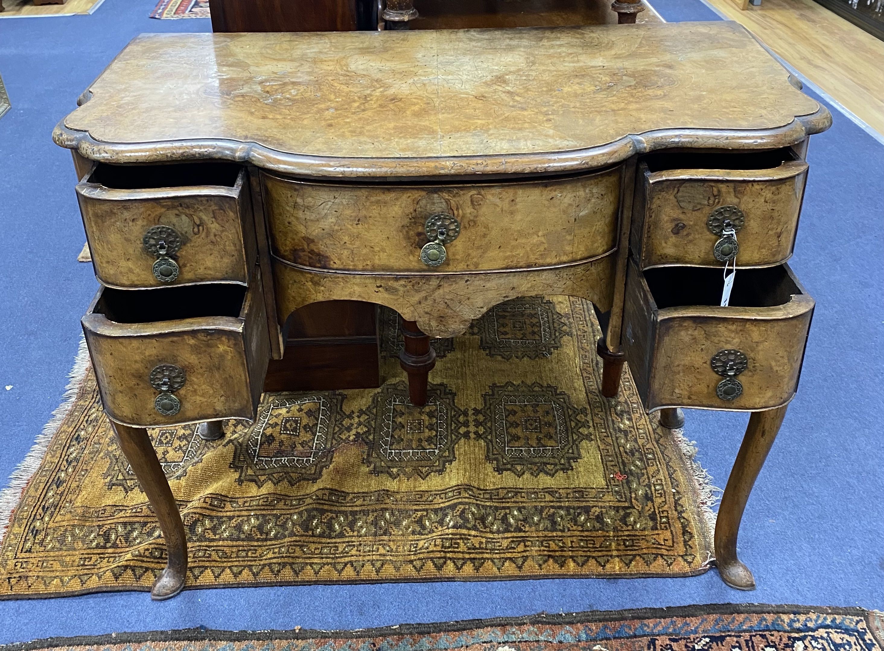 An 18th century style Dutch walnut bow front side table, width 91cm, depth 49cm, height 76cm